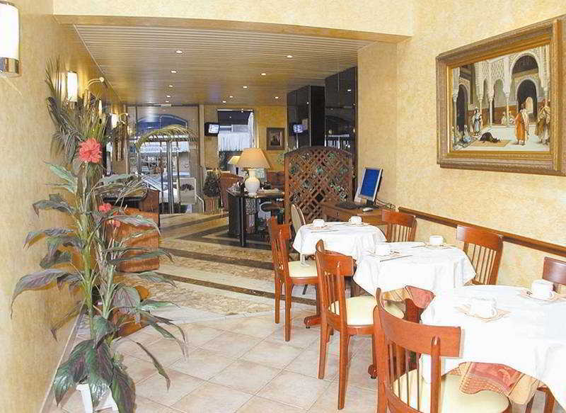 Hotel Poussin Paris Restaurang bild